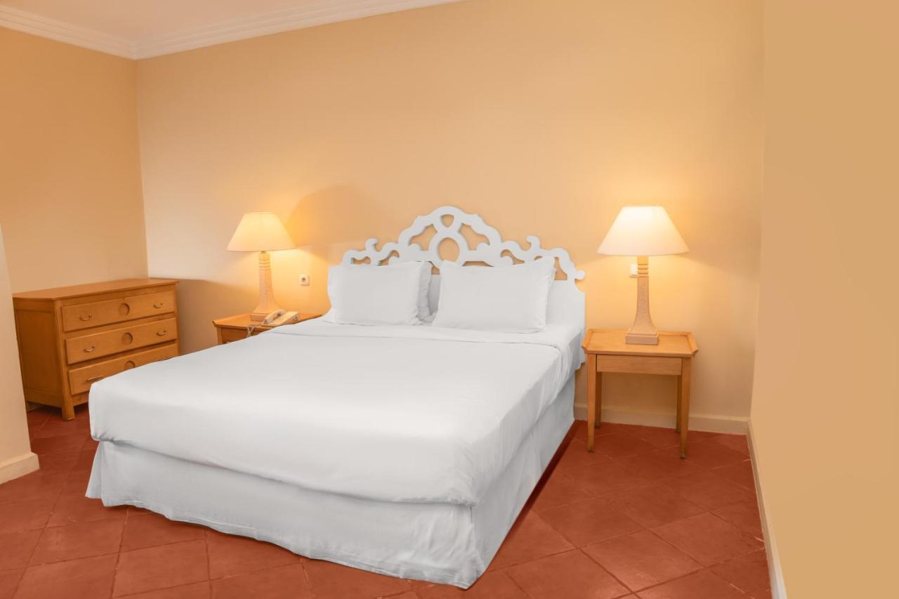 Hotel Sharm Dreams Vacation Club - Aqua Park Exterior foto A bed with a bed skirt