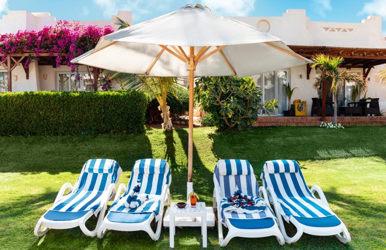 Hotel Sharm Dreams Vacation Club - Aqua Park Exterior foto A patio umbrella