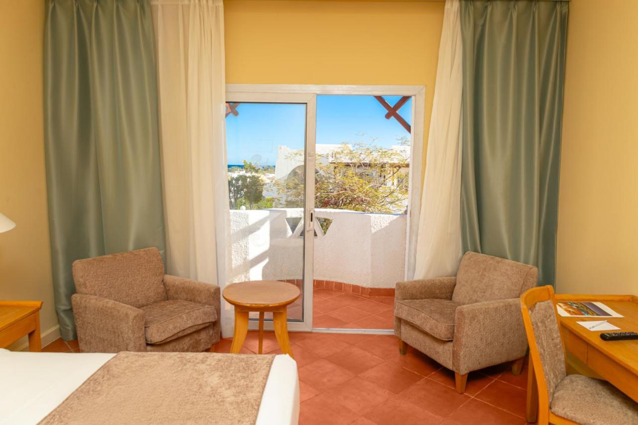 Hotel Sharm Dreams Vacation Club - Aqua Park Exterior foto A room at the hotel